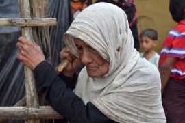An 80-year-old Rohingya woman stands to rest at Kutupalong refugee camp in Ukhiya, Bangladesh, on September 3, 2017.Around 400 people -- most of them Rohingya Muslims -- have died in communal violence searing through Myanmar's Rakhine state, the army chief's office said September 1, with tens of thousands forced to flee across the border into Bangladesh. A further 20,000 Rohingya have massed along the Bangladeshi frontier, while scores of desperate people have drowned