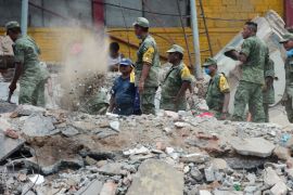 Mexican Army and Navy members remove rubble after the Town Hall building partially collapsed following an 8.2 earthquake that hit Mexico's Pacific coast, in Juchitan de Zaragoza, state of Oaxaca on September 8, 2017. Mexico's most powerful earthquake in a century killed at least 35 people, officials said, after it struck the Pacific coast, wrecking homes and sending families fleeing into the streets. / AFP PHOTO / RONALDO SCHEMIDT (Photo credit should read RONALDO SCHEMIDT/AFP/Getty Images)