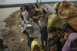 SHAH PORIR DIP, BANGLADESH - SEPTEMBER 14: Rohingya are seen after arriving on a boat to Bangladesh on September 14, 2017 in Shah Porir Dip, Bangladesh. Around 370,000 Rohingya refugees have fled into Bangladesh since late August during the outbreak of violence in the Rakhine state. Myanmar's de facto leader Aung San Suu Kyi announced that she will miss next week's UN General Assembly as criticism on her handling of the Rohingya crisis grows while her government has been accused of ethnic cleansing. According to reports, the total death toll from Rohingya boat capsize incidents rose to 84 while many people have died trying to get out, including children and infants. (Photo by Allison Joyce/Getty Images)