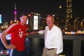 SHANGHAI, CHINA - JULY 20: Robert Lewandowski (L) of FC Bayern Muenchen attends with Karl-Heinz Rummenigge, CEO of FC Bayern Muenchen the Audi Night 2017 at Wanda Reign Hotel Shanghai during the Audi Summer Tour 2017 on July 20, 2017 in Shanghai, China. (Photo by Alexander Hassenstein/Bongarts/Getty Images)