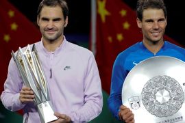 Tennis - Shanghai Masters tennis tournament - Men's Singles Finals - Shanghai, China - October 15, 2017 - Winner Roger Federer of Switzerland and Rafael Nadal of Spain hold trophies after the match. REUTERS/Aly Song