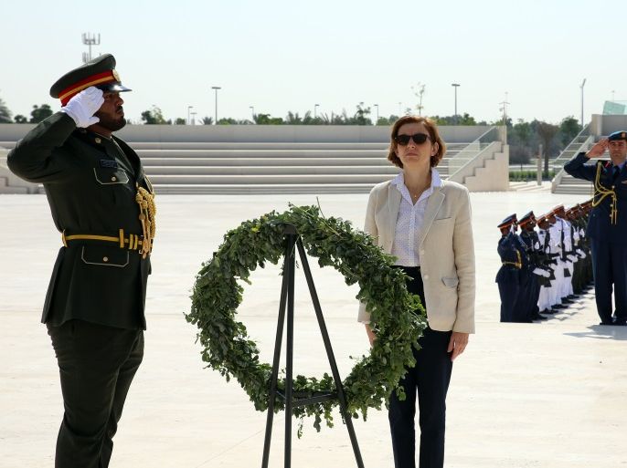 Sheikh Khalifa bin Tahnoon bin Mohamed al-Nahyan (R) looks on as French Defence Minister Florence Parly (C) lays a wreath during a visit to the Wahat al-Karama memorial site in Abu Dhabi on October 29, 2017. / AFP PHOTO / NEZAR BALOUT (Photo credit should read NEZAR BALOUT/AFP/Getty Images)
