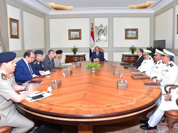 Egyptian President Abdel Fattah al-Sisi chairs a meeting with Interior Minister General Magdi Abdel Ghaffar, Defense Minister Sedki Sobhi, Intelligence Chief Khaled Fawzi and other officials in Cairo, Egypt October 22, 2017 in this handout picture courtesy of the Egyptian Presidency. The Egyptian Presidency/Handout via REUTERS ATTENTION EDITORS - THIS IMAGE WAS PROVIDED BY A THIRD PARTY