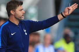 Tottenham Hotspur's Argentinian head coach Mauricio Pochettino gestures during the English Premier League football match between Huddersfield Town and Tottenham Hotspur at the John Smith's stadium in Huddersfield, northern England on September 30, 2017. / AFP PHOTO / Lindsey PARNABY / RESTRICTED TO EDITORIAL USE. No use with unauthorized audio, video, data, fixture lists, club/league logos or 'live' services. Online in-match use limited to 75 images, no video emulation. No use in betting, games or single club/league/player publications. / (Photo credit should read LINDSEY PARNABY/AFP/Getty Images)