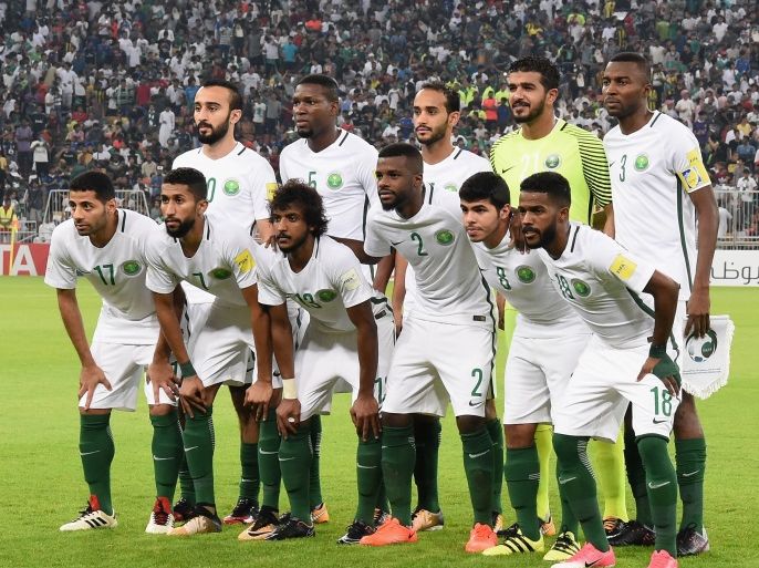 JEDDAH, SAUDI ARABIA - SEPTEMBER 05: Saudi Arabia players line up for the team photos prior to the FIFA World Cup qualifier match between Saudi Arabia and Japan at the King Abdullah Sports City on September 5, 2017 in Jeddah, Saudi Arabia. (Photo by Kaz Photography/Getty Images)