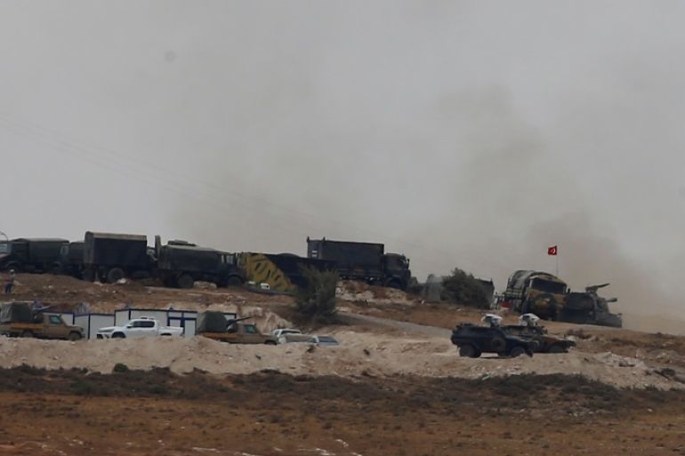 Turkish military vehicles are seen on the Turkish-Syrian border line in Reyhanli, Hatay province, Turkey, October 9, 2017. REUTERS/Osman Orsal
