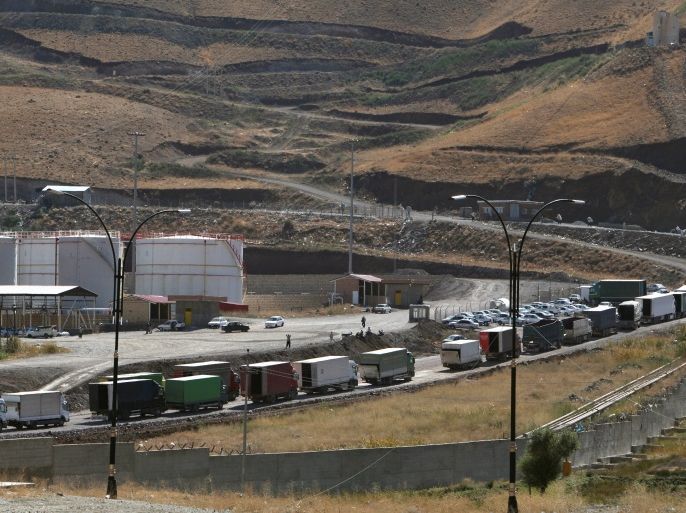 Trucks are seen at Haj Omran border, on the border between Iran and Kurdistan, Iraq October 14, 2017. Picture taken October 14, 2017. REUTERS/Azad Lashkari