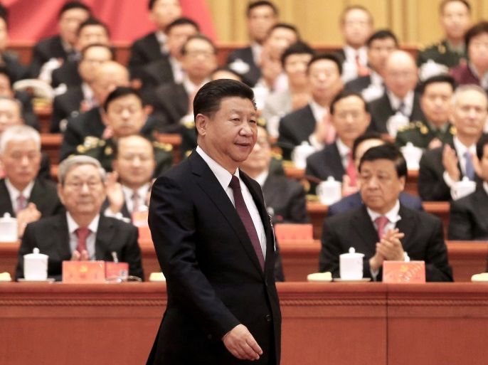 Chinese President Xi Jinping walks to the lectern to deliver his speech during the opening session of the 19th National Congress of the Communist Party of China at the Great Hall of the People in Beijing, China October 18, 2017. Picture taken October 18, 2017. China Daily via REUTERS ATTENTION EDITORS - THIS IMAGE WAS PROVIDED BY A THIRD PARTY. CHINA OUT.