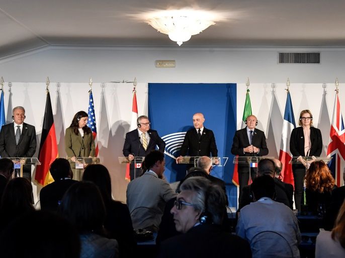 (LtoR) EU Commissioner for Migration, Home Affairs and Citizenship Dimitris Avramopoulos, US Acting Secretary of the Department of Homeland Security Elaine Duke, Canada's Public Safety Minister Ralph Goodale, Italy's Interior Minister Marco Minniti, France's Interior Minister Gerard Collomb, Britain's Home Secretary Amber Rudd and the Chairperson of the National Public Safety Commission from Japan Achiro Hoconogi address a press conference at the end of the G7 summi