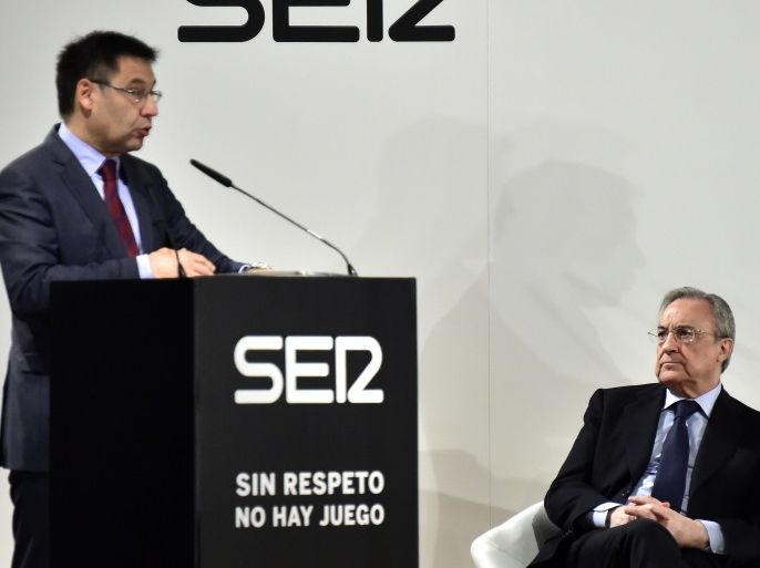 Barcelona President Josep Maria Bartomeu (L) speaks next to Real Madrid President Florentino Perez during the presentation of a PRISA and UNESCO awarness campaign dubbed 'Sin respeto no hay juego' (No respect no game) at Madrid Traje museum in Madrid on January 24, 2017 whose objective is to 'fight discrimination and racism in football in Spain and Latin America'. / AFP / GERARD JULIEN (Photo credit should read GERARD JULIEN/AFP/Getty Images)