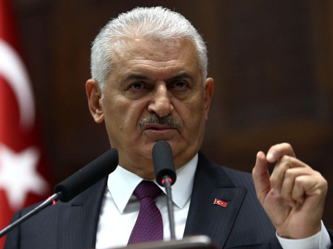 Turkish Prime Minister Binali Yildirim gestures as he delivers a speech during the AK Party's group meeting at the Grand National Assembly of Turkey (TBMM) in Ankara, Turkey on October 10, 2017. / AFP PHOTO / ADEM ALTAN (Photo credit should read ADEM ALTAN/AFP/Getty Images)