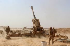 Iraqi forces fire preliminary shells from the area of al-Sakrah, as they prepare a military operation to push out Islamic State (IS) group jihadists from the nearby village of Anah in the northwestern Anbar province on September 12, 2017. / AFP PHOTO / MOADH AL-DULAIMI (Photo credit should read MOADH AL-DULAIMI/AFP/Getty Images)