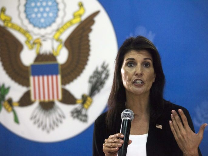 US Ambassador to the United Nations, Nikki Haley talks to staff members of the US embassy in Juba, South Sudan, on October 25, 2017. Nikki Haley arrived in Juba on October 25, seeking a solution to a nearly four-year conflict that has created a devastating humanitarian crisis. Haley, the most senior official sent to Africa by the Trump administration, is on a tour that has also taken her to Ethiopia and will include Democratic Republic of Congo. / AFP PHOTO / Albert Gon
