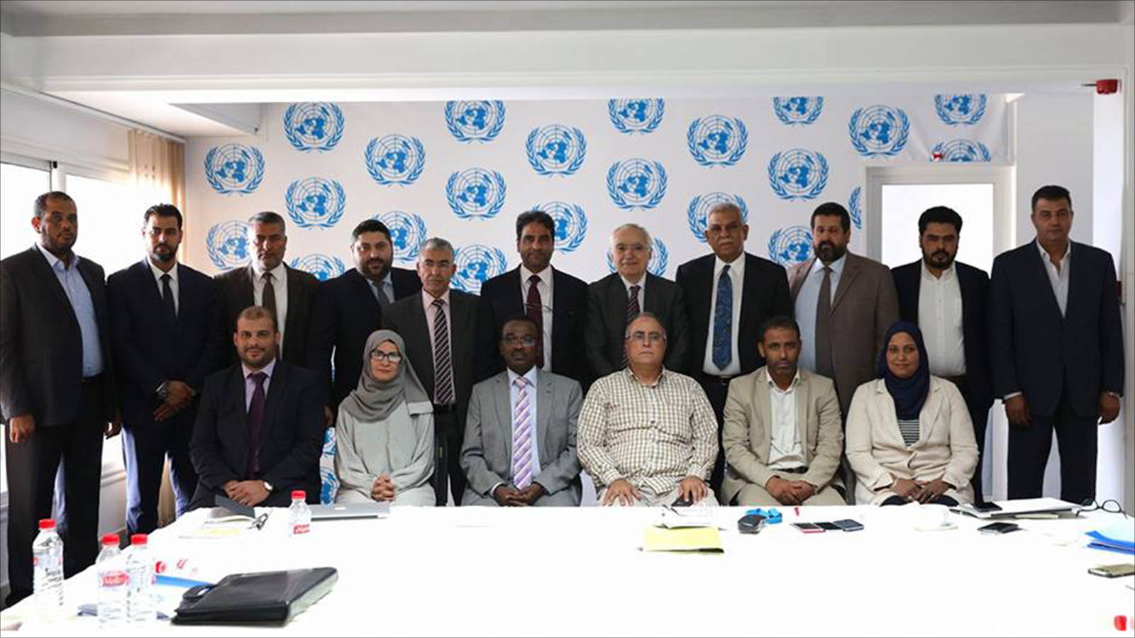 أعضاء لجنة الصياغة المشتركة المنبثقة عن لجنتي الحوار الليبي في تونس(الجزيرة)