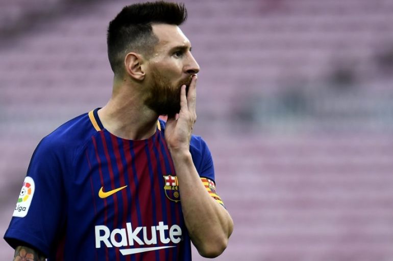 Barcelona's Argentinian forward Lionel Messi reacts after missing a goal opportunity during the Spanish league football match FC Barcelona vs UD Las Palmas at the Camp Nou stadium in Barcelona on October 1, 2017. / AFP PHOTO / JOSE JORDAN (Photo credit should read JOSE JORDAN/AFP/Getty Images)