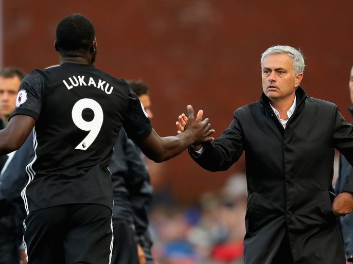 STOKE ON TRENT, ENGLAND - SEPTEMBER 09: Romelu Lukaku of Manchester United celebrates scoring his sides second goal with Jose Mourinho, Manager of Manchester United during the Premier League match between Stoke City and Manchester United at Bet365 Stadium on September 9, 2017 in Stoke on Trent, England. (Photo by Richard Heathcote/Getty Images)