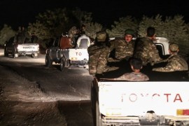 Pro-Ankara Syrian rebel fighters are seen riding on pickup trucks near the village of Hawar Killis along the Syrian-Turkish border in the northern province of Aleppo on October 6, 2017, as they advance towards jihadist-controlled Idlib province.Turkish President Recep Tayyip Erdogan said in a televised speech on October 7 that the pro-Ankara Syrian rebels were 'taking new steps to ensure security in Idlib'.Erdogan later told reporters the operation was led by 'Free Syrian Army' (FSA) rebels and that the Turkish army was not yet operating there. / AFP PHOTO / Nazeer al-Khatib (Photo credit should read NAZEER AL-KHATIB/AFP/Getty Images)