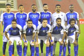 Al-Hilal's starting eleven pose for a group shot ahead of the Asian Champions League semi-final football match between Persepolis and Al-Hilal at the Sultan Qaboos Sports Complex in Muscat on October 17, 2017. / AFP PHOTO / STRINGER (Photo credit should read STRINGER/AFP/Getty Images)