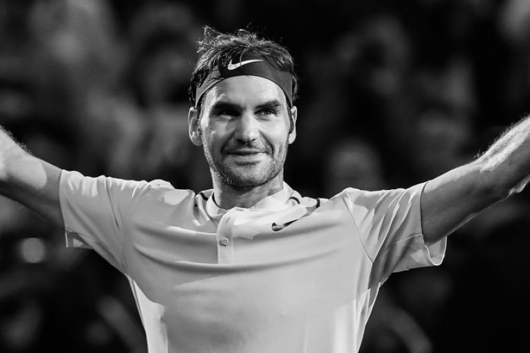 SHANGHAI, CHINA - OCTOBER 15: (EDITORS NOTE: Image has been converted to black and white.) Roger Federer of Switzerland celebrates after winning the Men's singles final mach against Rafael Nadal of Spain on day eight of 2017 ATP Shanghai Rolex Masters at Qizhong Stadium on October 15, 2017 in Shanghai, China. (Photo by Lintao Zhang/Getty Images)