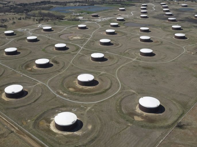 FILE PHOTO: Crude oil storage tanks are seen from above at the Cushing oil hub, in Cushing, Oklahoma, March 24, 2016. REUTERS/Nick Oxford/File Photo