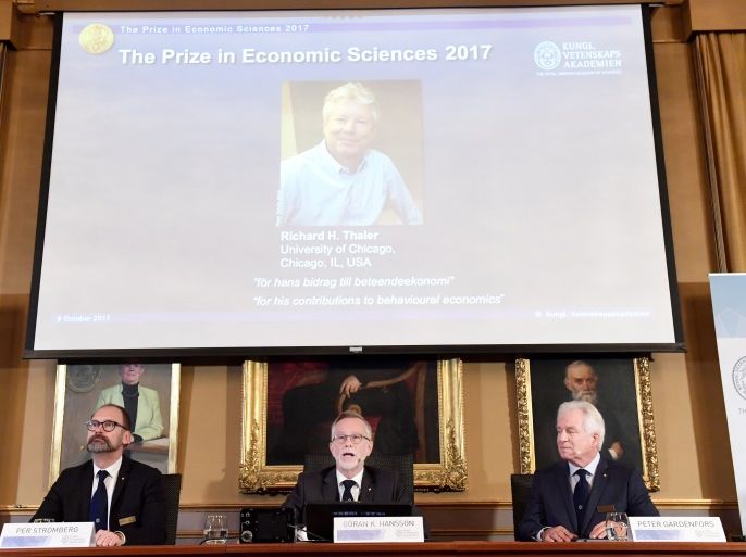 Photo of Richard H. Thaler is displayed on the screen during the announcement of the winner of the Nobel Prize in economic sciences 2017, officially called the Sveriges Riksbank Prize in Economic Sciences in Memory of Alfred Nobel, during a press conference in Stockholm, Sweden, October 9, 2017. TT News Agency/Henrik Montgomery via REUTERS ATTENTION EDITORS - THIS IMAGE WAS PROVIDED BY A THIRD PARTY. SWEDEN OUT. NO COMMERCIAL OR EDITORIAL SALES IN SWEDEN