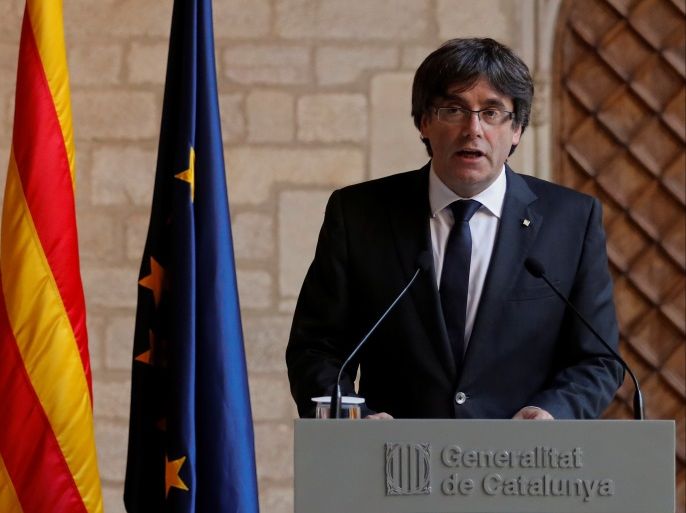 Catalan President Carles Puigdemont delivers a statement at the regional government headquarters, in Barcelona, Spain, October 26, 2017. REUTERS/Yves Herman