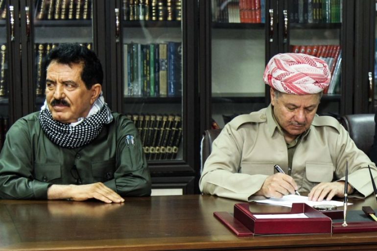 A file picture taken on September 12, 2017 shows Iraq's Kurdistan region president Massud Barzani (C) attending a meeting with Kirkuk provincial Governor Najim al-Din Karim (R), first Deputy for the Secretary General of the Patriotic Union of Kurdistan (PUK) party Kosrat Rasoul Ali (L), Peshmerga commander Jaafar Sheikh Mustafa (R), and other Peshmerga and Kurdish party leaders in the northern Iraqi city of Kirkuk. A Baghdad court on October 19, 2017, issued an arrest warrant for the vice president of Iraqi Kurdistan, Kosrat Rasul, on charges of 'provocation' against Iraq's armed forces, the judiciary said. / AFP PHOTO / MARWAN IBRAHIM (Photo credit should read MARWAN IBRAHIM/AFP/Getty Images)