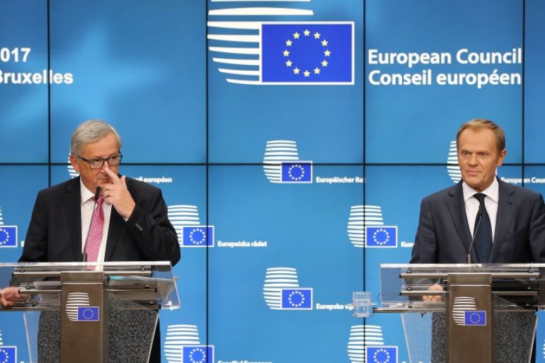 BRUSSELS, BELGIUM - OCTOBER 19: President of the European Council Donald Tusk, (R) and President of the European Commission Jean-Claude Juncker speak during a press conference after a European Council Meeting at the Council of the European Union building on October 19, 2017 in Brussels, Belgium. Britain's Prime Minister Theresa May attended along with the other 27 members Heads of State. Under discussion were the Iran Nuclear Deal, Brexit and North Korea. Mrs May offered assurances to EU nationals that her government will make it as easy as possible to remain living in the United Kingdom after Brexit. (Photo by Dan Kitwood/Getty Images)