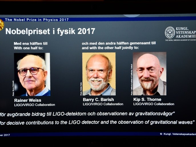 Laureates (L-R) Rainer Weiss, Barry C Barish and Kip S Thorne are pictured on a display during the announcement of the 2017 Nobel Prize winners in Physics on October 3, 2017, at the Royal Swedish Academy of Sciences in Stockholm. / AFP PHOTO / Jonathan NACKSTRAND (Photo credit should read JONATHAN NACKSTRAND/AFP/Getty Images)