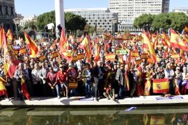People wave Spanish flags during a demonstration calling for unity at Plaza de Colon in Madrid on October 28, 2017, a day after direct control was imposed on Catalonia over a bid to break away from Spain.Spain moved to assert direct rule over Catalonia, replacing its executive and top functionaries to quash an independence drive that has plunged the country into crisis and unnerved secession-wary Europe. / AFP PHOTO / JAVIER SORIANO (Photo credit should read JAVIER SORIANO/AFP/Getty Images)