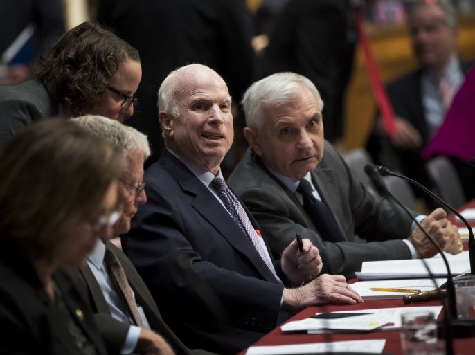 WASHINGTON, DC - OCTOBER 25: (L to R) Sen. John McCain (R-AZ) and Sen. Jack Reed (D-RI) attend an Armed Services conference committee meeting on the National Defense Authorization Act on Capitol Hill, October 25, 2017 in Washington, DC. (Photo by Drew Angerer/Getty Images)