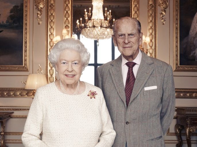 WINDSOR, ENGLAND - NOVEMBER: (THIS PHOTOGRAPH IS STRICTLY FOR EDITORIAL USE ONLY. THE IMAGE IS PROVIDED FOR FREE EDITORIAL USE UNTIL DECEMBER 3, 2017 WHEN IT MUST BE REMOVED FROM ALL SYSTEMS AND THOSE OF YOUR SUBSCRIBERS.) In this handout image issued by Camera Press, Queen Elizabeth II and Prince Philip, Duke of Edinburgh pose for a photo in the White Drawing Room at Windsor Castle in early November, in celebration of their platinum wedding anniversary on November 20,