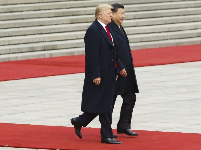 BEIJING, CHINA - NOVEMBER 9: U.S. President Donald Trump and China's President Xi Jinping attend a welcoming ceremony on November 9, 2017 in Beijing, China. Trump is on a 10-day trip to Asia. (Photo by Thomas Peter-Pool/Getty Images)
