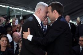 French President Emmanuel Macron and Israeli Prime Minister Benjamin Netanyahu shake hands after a ceremony commemorating the 75th anniversary of the Vel d'Hiv roundup, in Paris, France, July 16, 2017. REUTERS/Kamil Zihnioglu/Pool