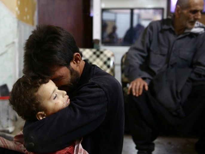 ATTENTION EDITORS Ð VISUALS COVERAGE OF SCENES OF INJURY OR DEATH A father holds the body of his 4-year-old son Muhannad al-Zahar at Douma hospital after heavy shelling in the rebel-held besieged town of Douma, eastern Ghouta in Damascus, Syria, November 19, 2017. REUTERS/Bassam Khabieh TEMPLATE OUT