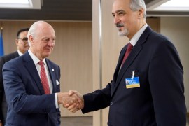 The United Nations Special Envoy for Syria, Staffan de Mistura (C) shakes hands with Bashar al-Jaafari, Syrian U.N. Ambassador, prior to a round of negotiations during the Intra Syria talks, at the European headquarters of the United Nations in Geneva, Switzerland, November 29, 2017. REUTERS/Martial Trezzini/Pool