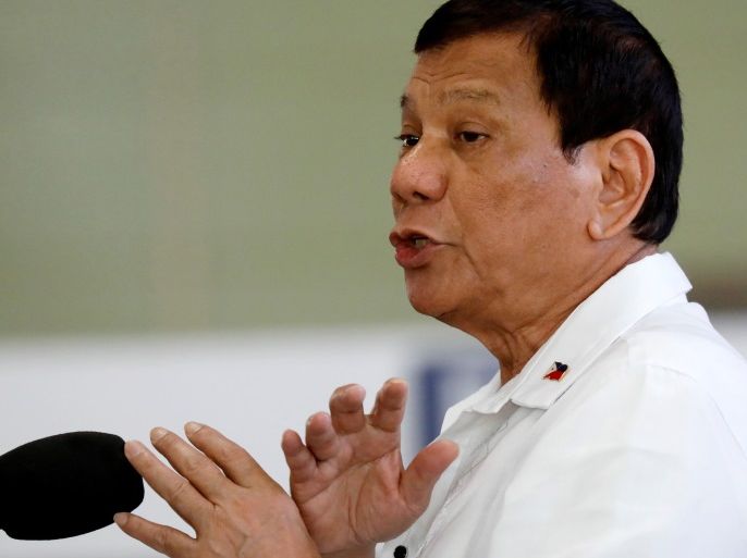 President Rodrigo Duterte gestures during a news conference before his departure to Da Nang in Vietnam, for the Asia Pacific Economic Cooperation (APEC) summit, at Ninoy Aquino International Airport in Pasay, metro Manila, Philippines November 8, 2017. REUTERS/Dondi Tawatao