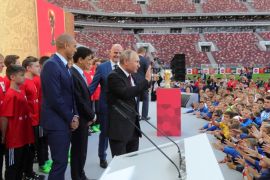 Russian President Vladimir Putin, FIFA President Gianni Infantino and former soccer players David Trezeguet of France and Bebeto of Brazil attend the FIFA World Cup Trophy Tour kick-off ceremony at the Luzhniki Stadium, which will host matches of the 2018 FIFA World Cup, in Moscow, Russia September 9, 2017. Sputnik/Mikhail Klimentyev/Kremlin via REUTERS ATTENTION EDITORS - THIS IMAGE WAS PROVIDED BY A THIRD PARTY.