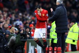 MANCHESTER, ENGLAND - FEBRUARY 11: Henrikh Mkhitaryan of Manchester United shakes hands with manager Jose Mourinho after being substituted during the Premier League match between Manchester United and Watford at Old Trafford on February 11, 2017 in Manchester, England. (Photo by Richard Heathcote/Getty Images)