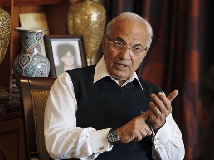Egypt's former prime minister Ahmed Shafik speaks during an interview with Reuters at his residence in Abu Dhabi February 6, 2013. Shafik is confident that with Egypt in turmoil seven months into its experiment with Islamist rule, its often-reviled political old guard will eventually be seen by Egyptians, and by Washington, in a more kindly light. Picture taken February 6, 2013. To match Interview EGYPT-CRISIS/ REUTERS/Jumana El Heloueh (UNITED ARAB EMIRATES - Tags