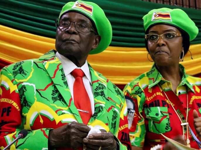 DATE IMPORTED:07 October, 2017Zimbabwean President Robert Mugabe and his wife Grace attend a meeting of his ruling ZANU PF party's youth league in Harare, Zimbabwe, October 7, 2017. REUTERS/Philimon Bulawayo