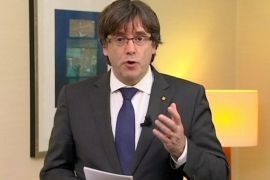 Sacked Catalan President Carles Puigdemont makes a statement in this still image from video calling for the release of