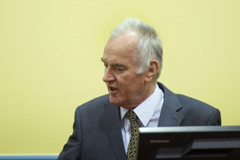 Former Bosnian Serb army commander Ratko Mladic attends his trial at the International Criminal Tribunal for the former Yugoslavia (ICTY) at The Hague May 16, 2012. Mladic, 70, appeared on Wednesday for his genocide trial looking confident, flashing a thumbs-up and clapping his hands as he entered the courtroom. REUTERS/Toussaint Kluiters/Pool (NETHERLANDS - Tags: POLITICS CRIME LAW)