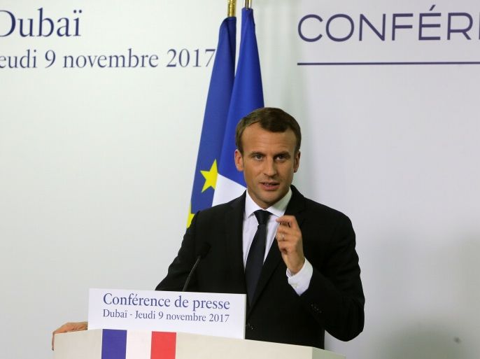 French President Emmanuel Macron gestures during a news conference in Dubai, UAE, November 9, 2017. REUTERS/Satish Kumar