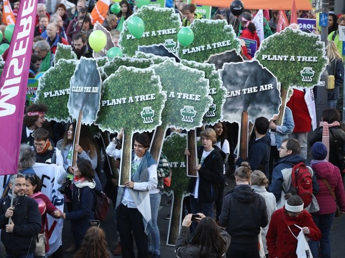 BONN, GERMANY - NOVEMBER 04: Climate change activists march to demonstrate against coal energy and other climate-related issues on November 4, 2017 in Bonn, Germany. The march, organized by over a dozen environmental activist groups, takes place two days before the COP 23 United Nations climate conference due to begin on Monday in Bonn and run through November 16. (Photo by Sean Gallup/Getty Images)