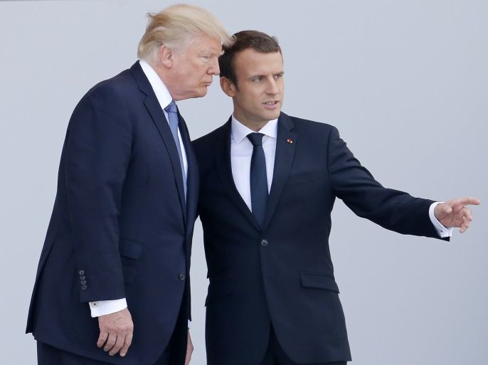 PARIS, FRANCE - JULY 14: U.S President Donald Trump and French President Emmanuel Macron attend the traditional Bastille day military parade on the Champs-Elysees on July 14, 2017 in Paris France. Bastille Day, the French National day commemorates this year the 100th anniversary of the entry of the United States of America into World War I. (Photo by Thierry Chesnot/Getty Images)