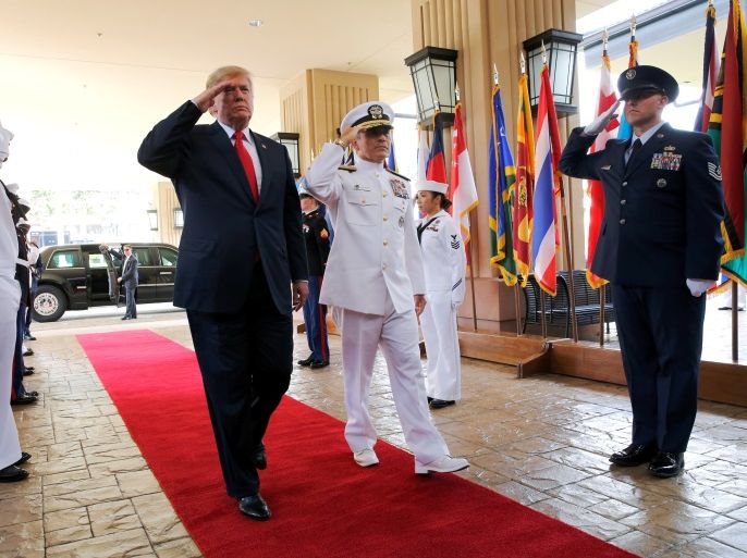 U.S. President Donald Trump is welcomed by U.S. Navy Admiral Harry Harris, commander of United States Pacific Command, at its headquarters in Aiea, Hawaii, U.S. November 3, 2017. REUTERS/Jonathan Ernst