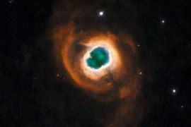 The Hubble Space telescope's soon-to-be decommissioned Wide Field Planetary Camera 2 photographed this image of planetary nebula K 4-55 as its final image, released by NASA May 10, 2009. This Hubble image was taken by WFPC2 on May 4, 2009. The colors represent the makeup of the various emission clouds in the nebula: red represents nitrogen, green represents hydrogen, and blue represents oxygen. K 4-55 is nearly 4,600 light-years away in the constellation Cygnus. REUTERS/NASA, ESA, and the Hubble Heritage Team (STScI/AURA)/Handout (UNITED STATESD SCI TECH) FOR EDITORIAL USE ONLY. NOT FOR SALE FOR MARKETING OR ADVERTISING CAMPAIGNS