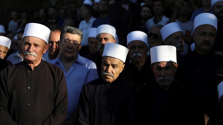 Members of the Druze community attend the funeral of Israeli Druze police officer Kamil Shanan in the village of Hurfeish, Israel July 14 2017 REUTERS/Ammar Awad