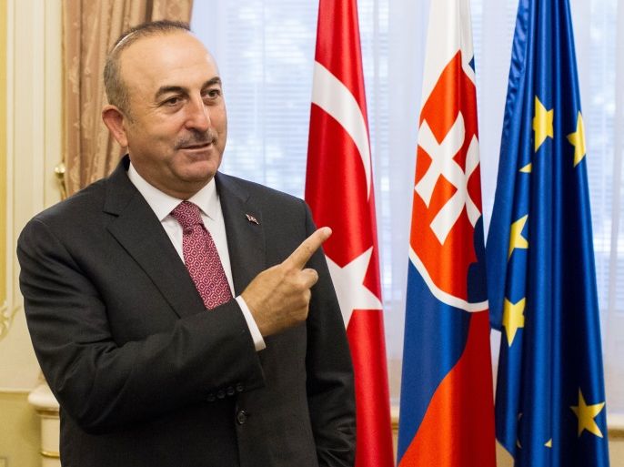 a05990952 Turkish Foreign Minister Mevluet Cavusoglu waits before his meeting with Slovakian Prime Minister Robert Fico